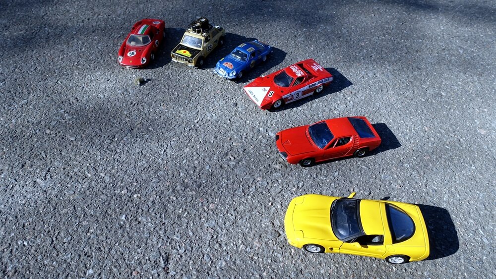 A lineup of multicolored toy cars. Find 11 easy ways to get free toys for kids here.