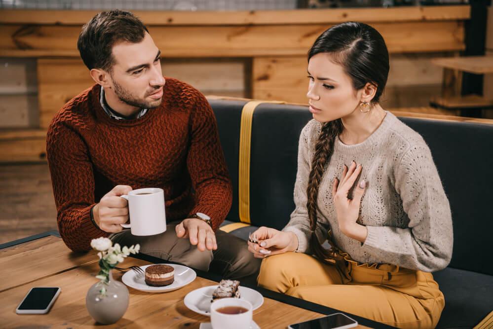 A man and a woman in a serious conversation. These are your friends after divorce: 7 friends single moms need and where to find them. Visit here for more info.