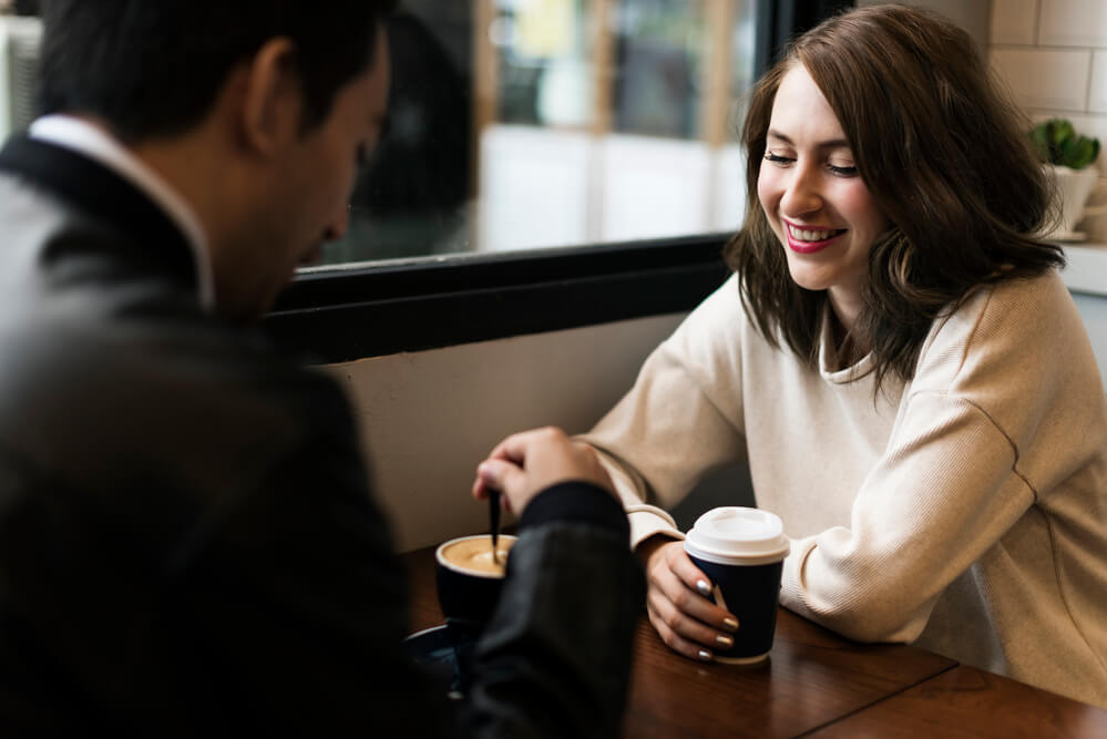The woman is enjoying coffee with her date. You'll never know when you'll meet the love of your life. Maybe you'll meet him at a coffee shop or on a dating site like Big Church.